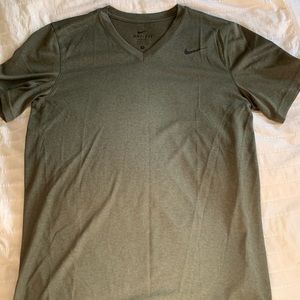 Olive green Nike size small shirt.